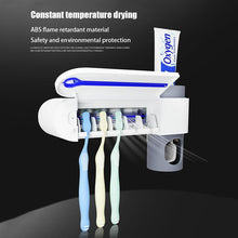 Load image into Gallery viewer, Toothbrush Sterilizer Automatic Aqueezer Toothbrush Holder
